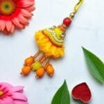 Fancy Yellow Pearl Lumba Rakhi